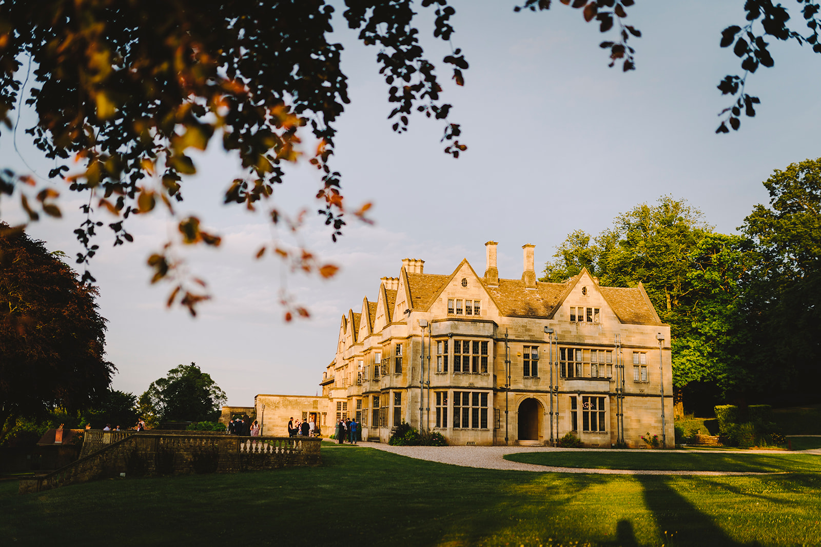 Coombe Lodge, a large mansion situated in the middle of a grassy field, offers an enchanting backdrop for couples looking to capture their special moments with a talented Bristol wedding photographer.